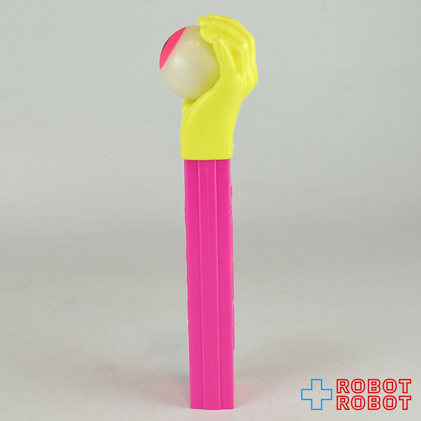 PEZ サイケデリックアイ ネオンカラー 黄ハンド/ピンクステム