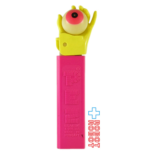 PEZ サイケデリックアイ ネオンカラー 黄ハンド/ピンクステム