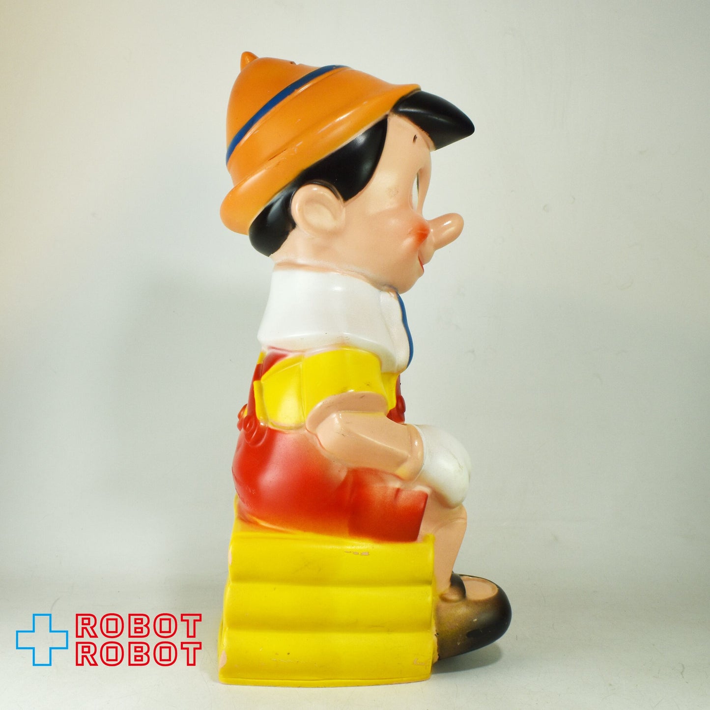 プレイパル社 ディズニー ピノキオ ラージ 薄茶帽子水色羽 ソフビ貯金箱 バンク フィギュア