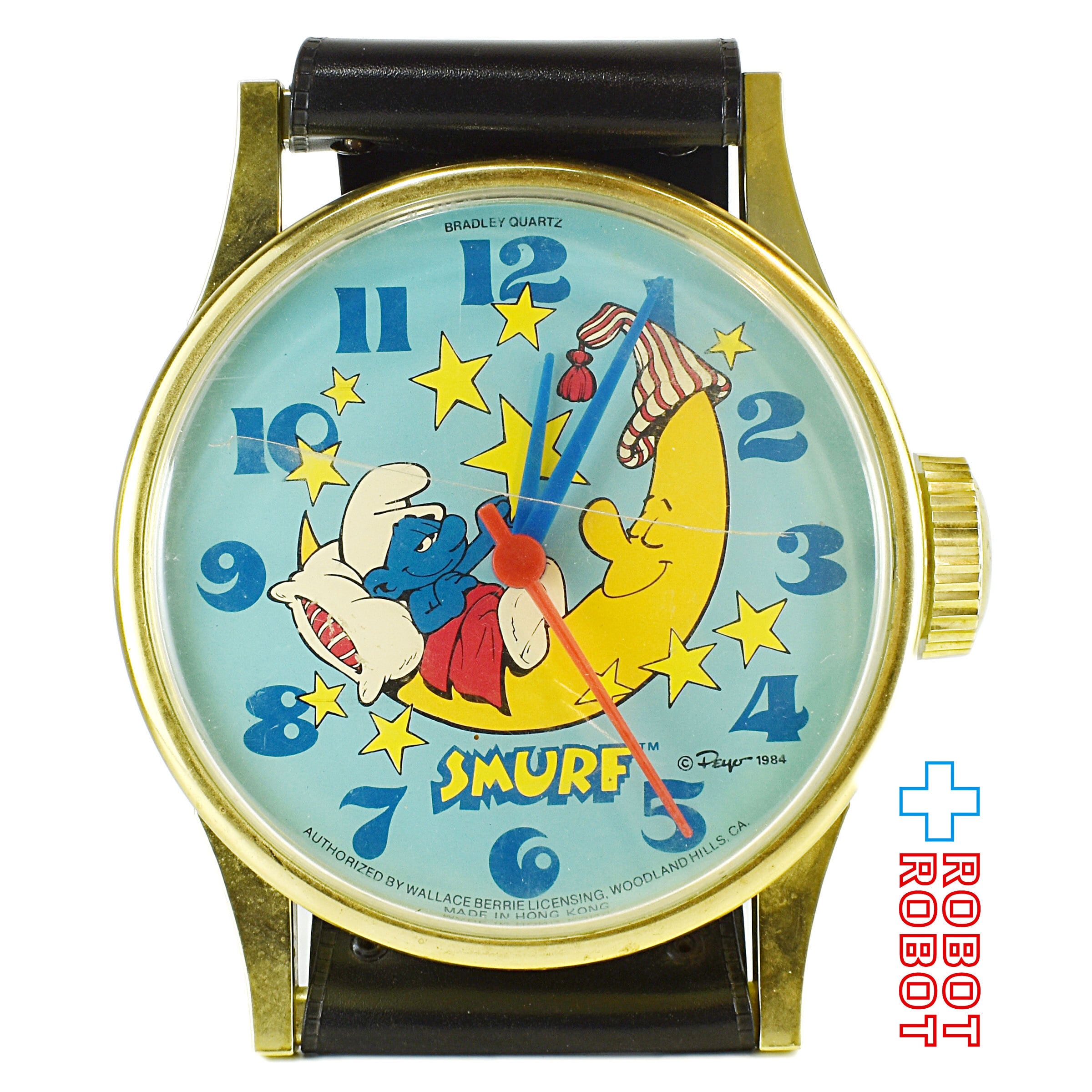 スマーフ 腕時計型の壁掛け時計 ブラッドリー社 1984 – ROBOTROBOT